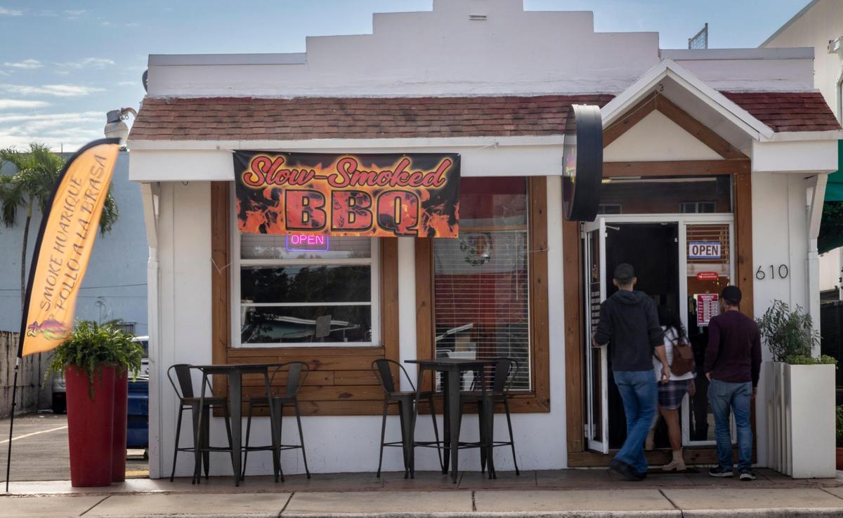 Customers arrive at La Veridica BBQ in Hialeah for lunch.