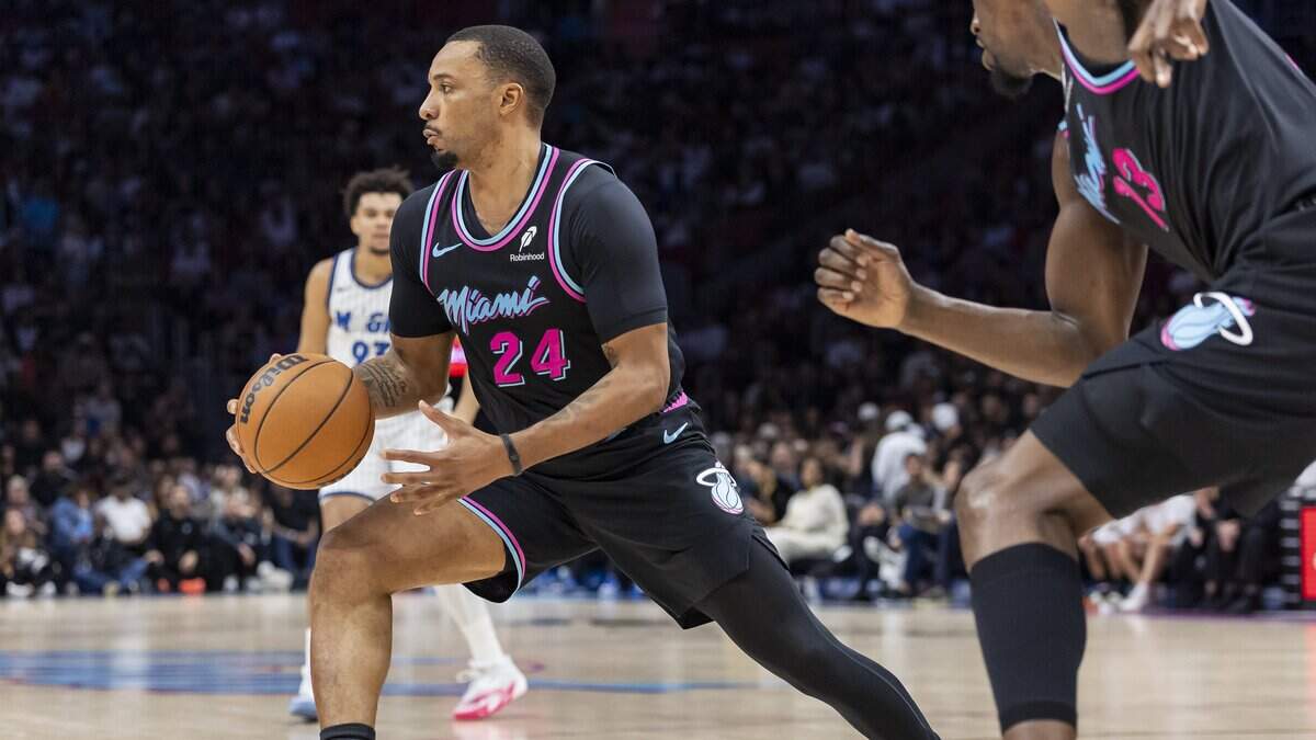 Miami Heat guard Norman Powell (24) drives the ball down the court against the Orlando Magic in the second half of their NBA game at the Kaseya Center on March 14, 2026, in Miami.