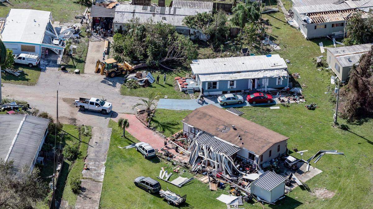 An aerial view of the damaged homes and fallen trees caused by Hurricane Ian are seen in the vicinity of Fort Myers on Thursday, September 29, 2022.