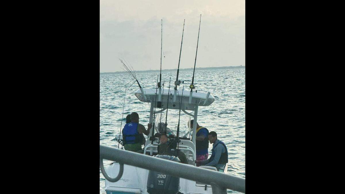 The family was taken ashore and the boat was left anchored, officials say. The owner is working with a salvage and recovery company.