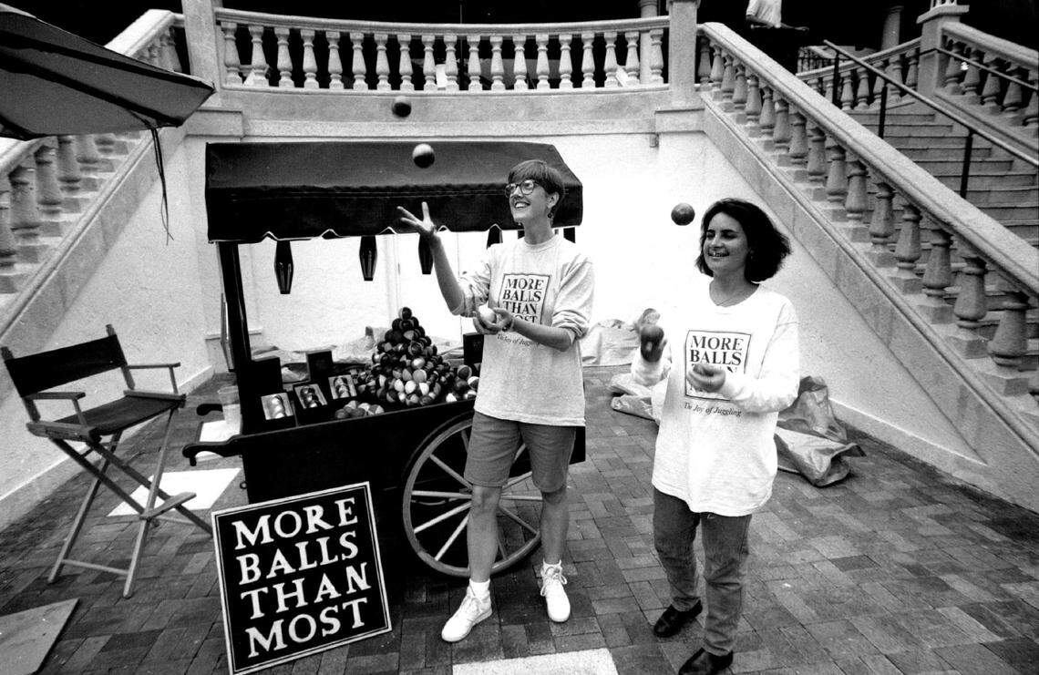 Kelly Robbins, left, and Heleb Reece stand ready to teach you how to juggle at CocoWalk in 1991.