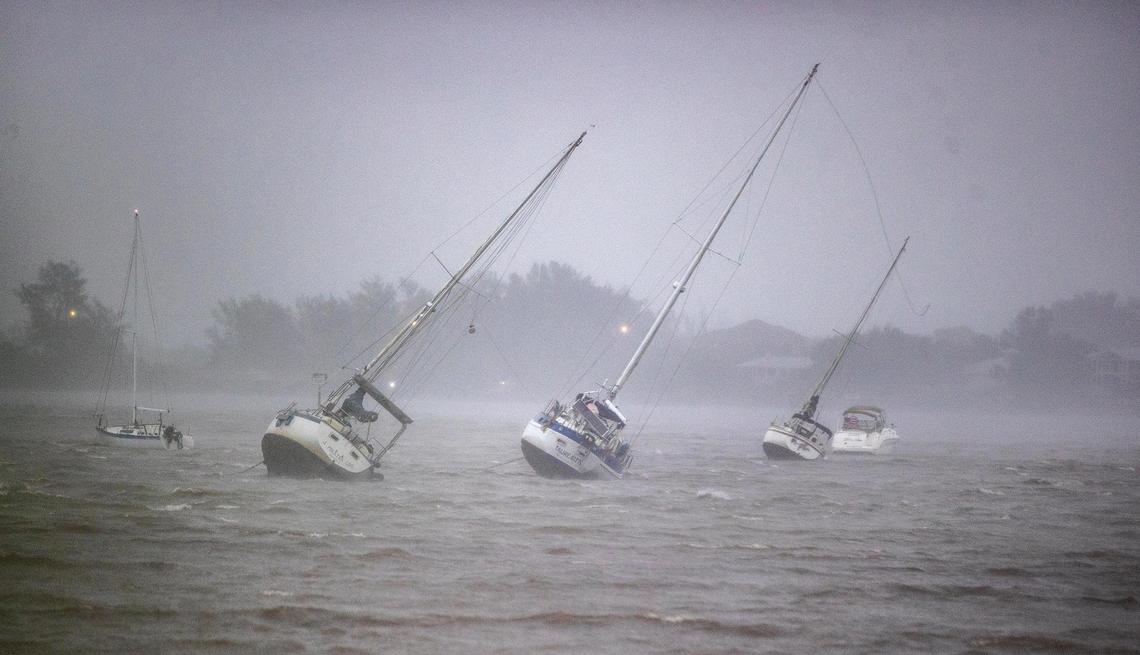 Sailboats anchored in Roberts Bay are blown around by 50 mph winds in Venice, Florida, as Hurricane Ian, a potential Category 5, approaches the west coast of Florida on Wednesday, Sept. 28, 2022.