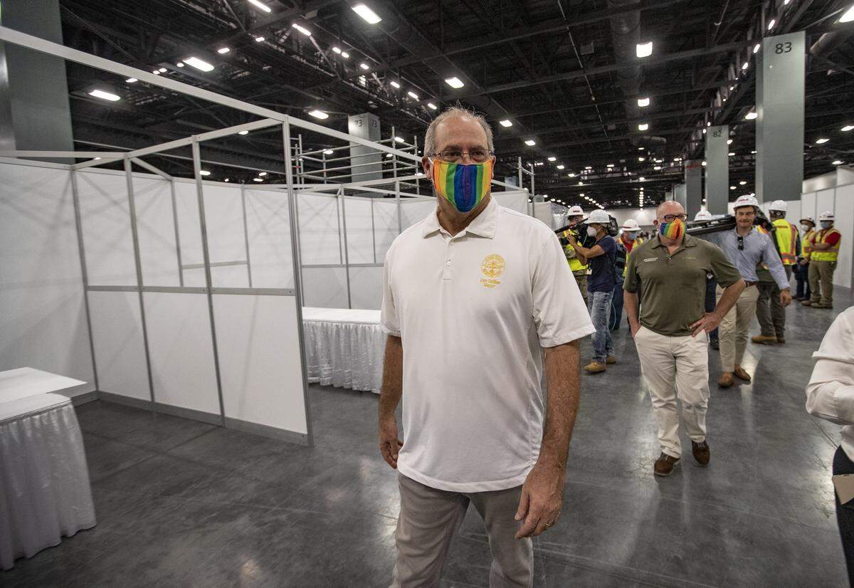 Miami Beach Mayor Dan Gelber tours the Miami Beach Convention Center as the Army Corps of Engineers builds a coronavirus field hospital inside the facility on Wednesday, April 8, 2020.