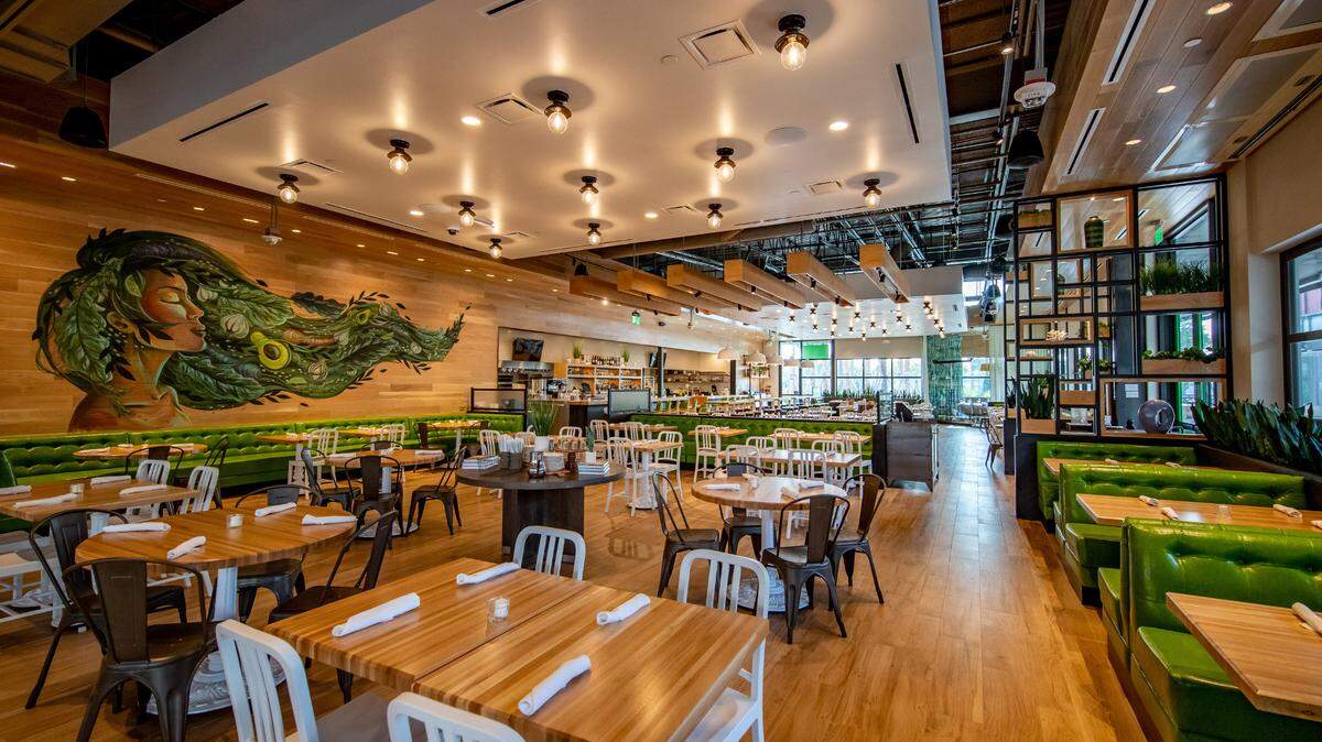 The interior dining room of True Food Kitchen at The Falls in Kendall. There’s also an outdoor patio and private dining area.