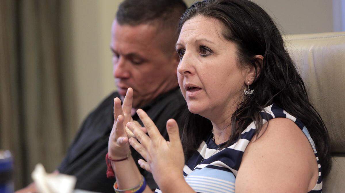 Miami, Florida, May 1, 2018 -  Ronald Creed (left) and Sarah Hancock (right), the parents of Damian Creed, a 4-year-old boy who died in November 2016 from eye cancer that spread to the rest of his body, speak to Miami Herald reporter, Daniel Chang at the Law Offices of Weinberg Wheeler Hudgins Gunn & Dial. 
Doctors at Nicklaus Children's Hospital in Miami had diagnosed Damian's left eye with an aggressive cancer called retinoblastoma, which was at an advanced stage when he first presented to the hospital in May 2014. And though the standard of medical care for advanced stage retinoblastoma calls for doctors to remove the affected eye in order to save the patient's life, doctors at Nicklaus Children's chose to give Damian chemotherapy and laser treatments for nearly two years instead of removing the eye. The cancer spread to Damian's optic nerve, then his brain and the rest of his body, and doctors were unable to save his life.
