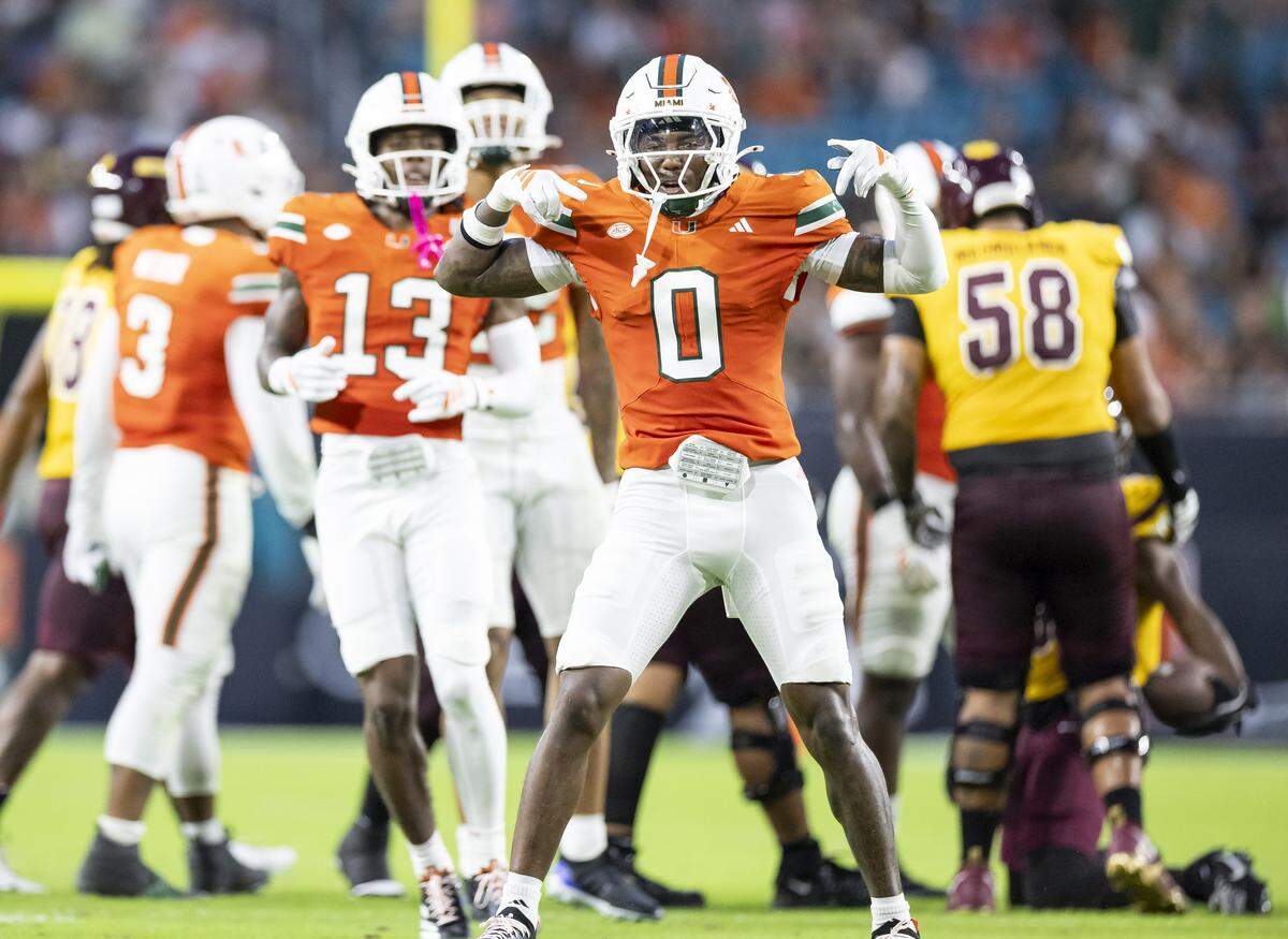 Miami Hurricanes defensive back Keionte Scott (0) celebrates after a play against Bethune-Cookman Wildcats in the first half of their NCAA football game at Hard Rock Stadium on Saturday, Sept. 6, 2025, in Miami Gardens, Fla.