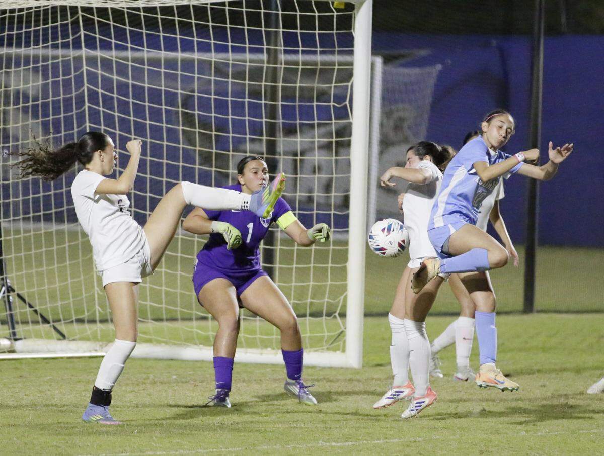 Lourdes Academy attempts to score against Pembroke Pines Charter during the Region 4-5A final girls soccer match on Tuesday, February 17, 2026 at Miami-Dade College Kendal campus. Andrew Uloza / for Miami Herald