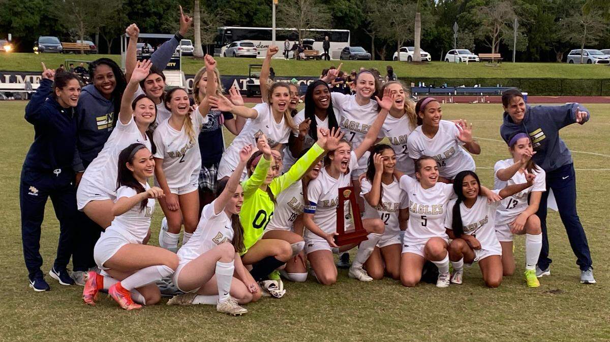North Broward Prep’s girls’ soccer team celebrates its first-ever trip to the state semifinals following its victory in penalty kicks over Palmer Trinity on Tuesday afternoon in the Region 4-3A final.
