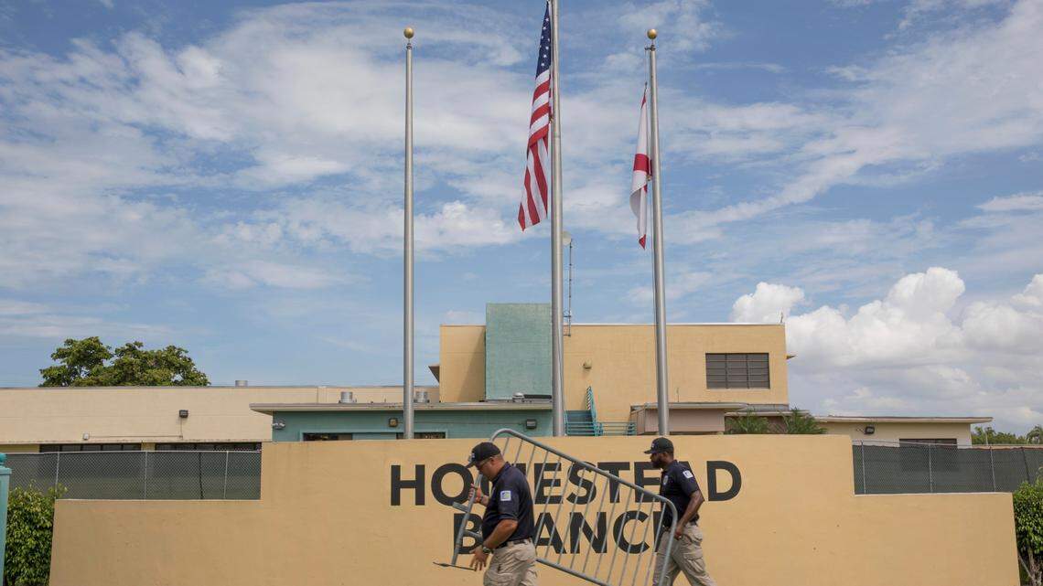 Security guards from Akima Global Services, a third-party contracted to guard the Homestead Temporary Shelter for Unaccompanied Children, prepare for a protest in front of the shelter on Saturday, June 23, 2018. Protesters and civil rights activists from across South Florida later participated in the ‘March to Free the Children Held in Detention’ in response to undocumented children being separated from their parents.