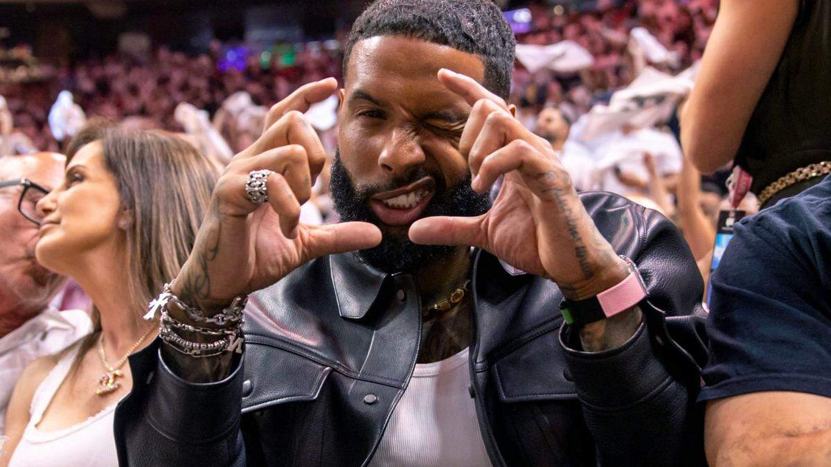 Former NFL player Odell Beckham Jr. reacts from court side during the first half of Game 4 of the NBA Finals between the Miami Heat and the Denver Nuggets at the Kaseya Center on Friday, June 9, 2023, in downtown Miami, Fla.