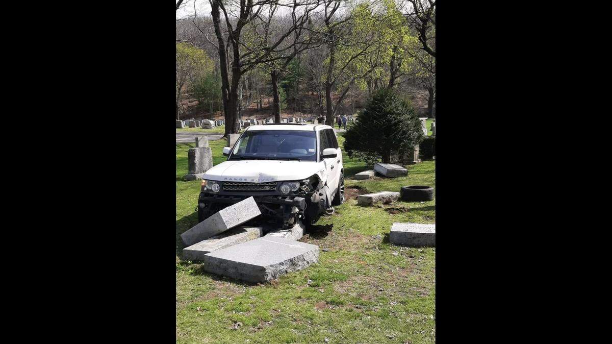 A woman learning to drive lost control behind the wheel and crashed into multiple tombstones at a cemetery in Melrose, Massachusetts, police said.