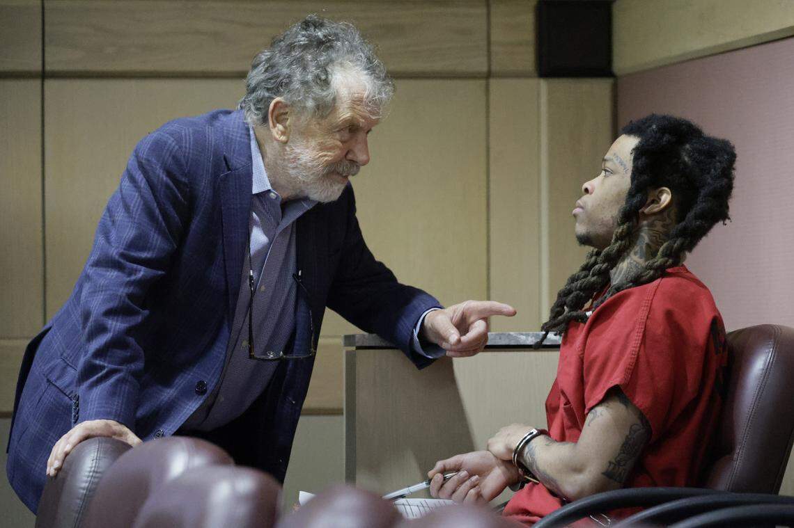 Cortlen Henry, known as the rap star YNW Bortlen and co-defendant of YNW Melly, confers with his defense attorney Fred Haddad during a hearing in Broward County court on Tuesday, Sept. 9, 2025. Henry is set to plead no contest to accessory to murder in the shooting deaths of rappers Anthony “YNW Sakchaser” Williams and Christopher “YNW Juvy” Thomas Jr. Prosecutors say Henry was the driver when Melly opened fire, then helped stage the scene to look like a drive-by. (Mike Stocker/South Florida Sun Sentinel)