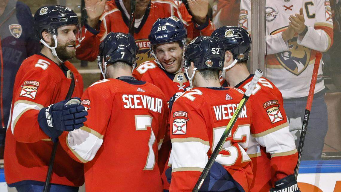 Florida Panthers left wing Mike Hoffman (68) celebrates with teammates after scoring in the third period as the Florida Panthers host the Montreal Canadiens at the BB&T Center in Sunrise on Saturday, March 7, 2020.
