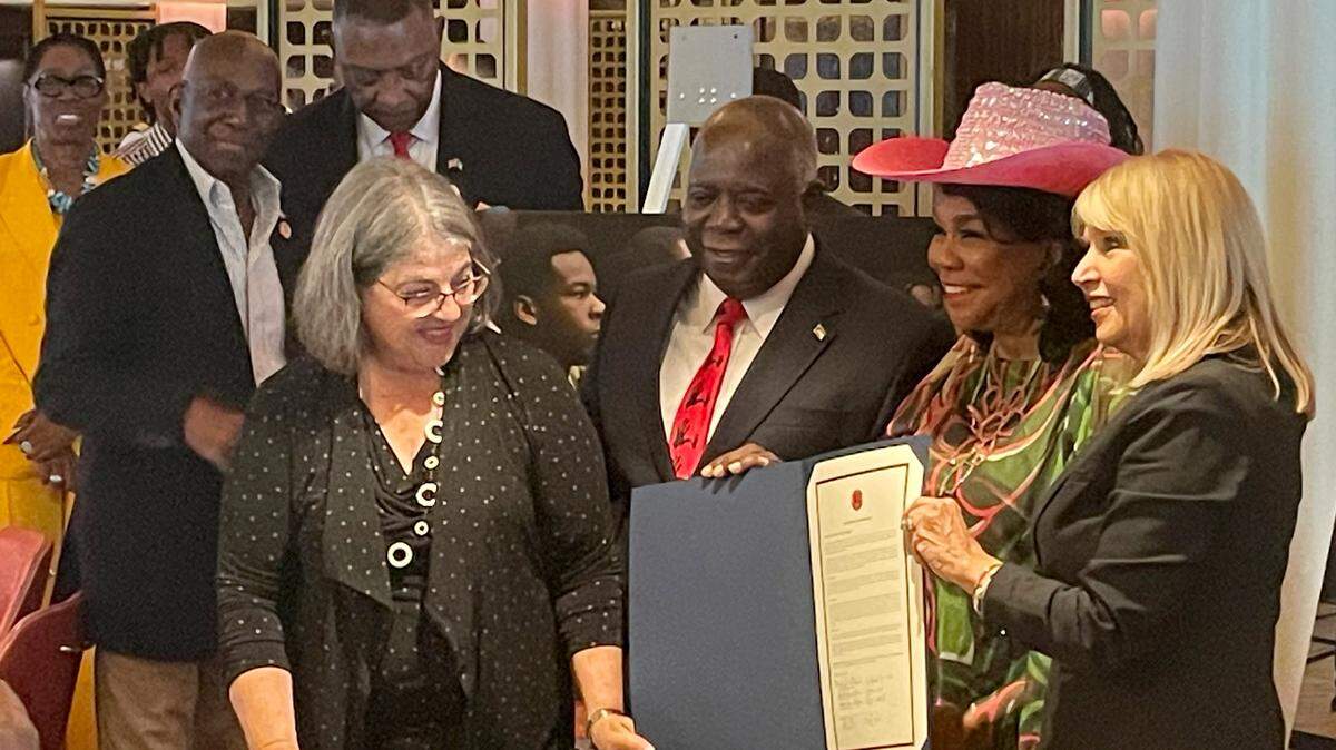 From left to right, Miami-Dade County Mayor, Daniella Levine Cava, Bahamian Prime Minister, Philip Davis, Congresswoman Frederica S. Wilson, FL-24, and Miami-Dade County Schools Board Chair, Mari Tere Rojas, pose after Congresswoman Wilson announced the opening of the Role Models program’s first international chapter in the Bahamas on Sunday, Oct. 1, 2023.