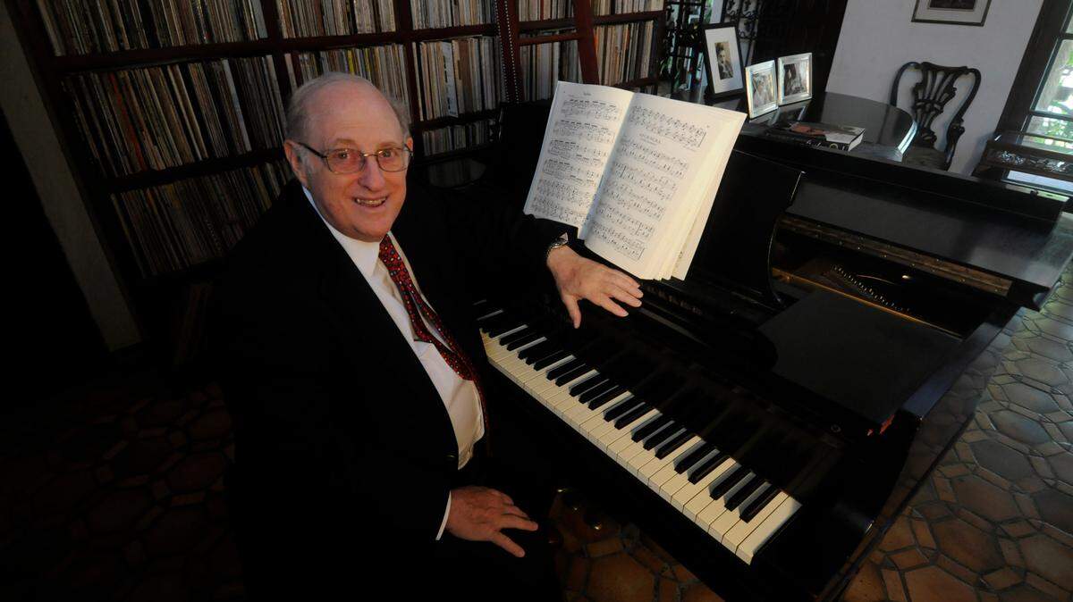 In this file photo from April 27, 2010, lawyer Julian Kreeger, in his Miami Beach home, reflects on his 25 years of running Friends of Chamber Music, a series at the University of Miami’s Gusman Hall.