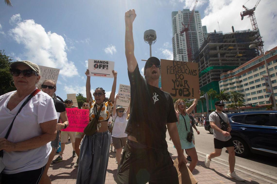 Thousands turned out in South Florida has part of nationwide day of demonstrations against the Trump administration on Saturday, including this group of marchers in downtown Miami..