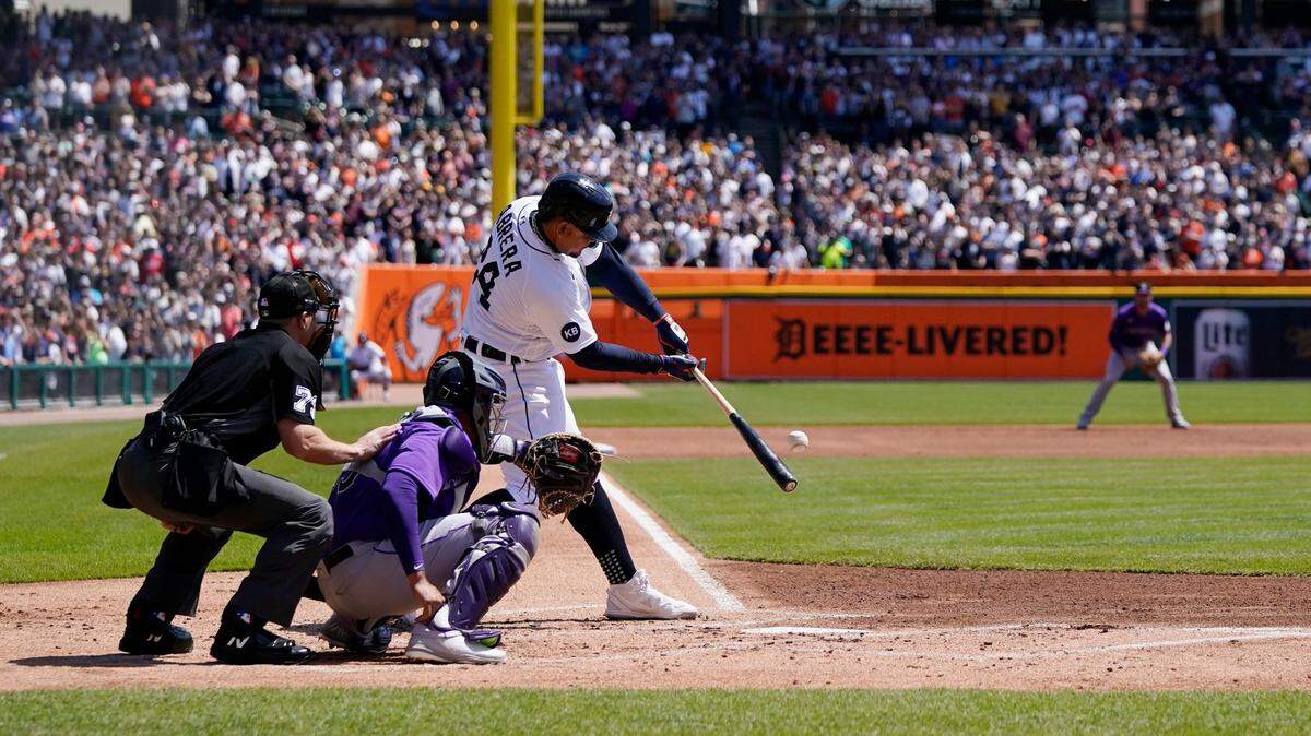 Detroit Tigers designated hitter Miguel Cabrera connects for his 3,000th hit during the first inning of the first baseball game of a doubleheader against the Colorado Rockies, Saturday, April 23, 2022, in Detroit.