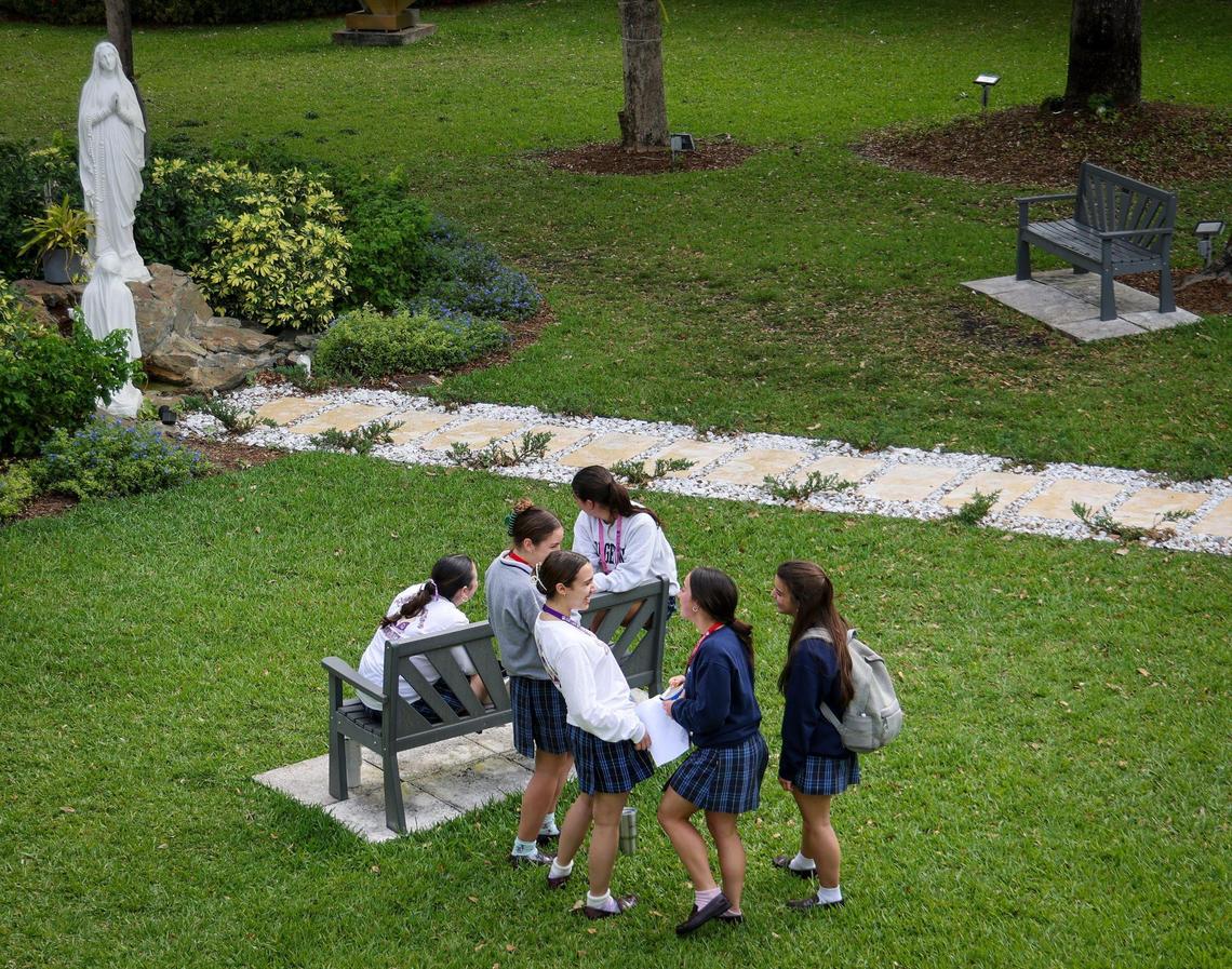 Students at Our Lady of Lourdes Catholic Academy in South Miami talk among themselves during lunch recess. While Catholic schools in South Florida have experienced a rise in enrollment in the 2023-2024 school year, Lourdes has an enrollment cap, allowing their numbers to stay the same.