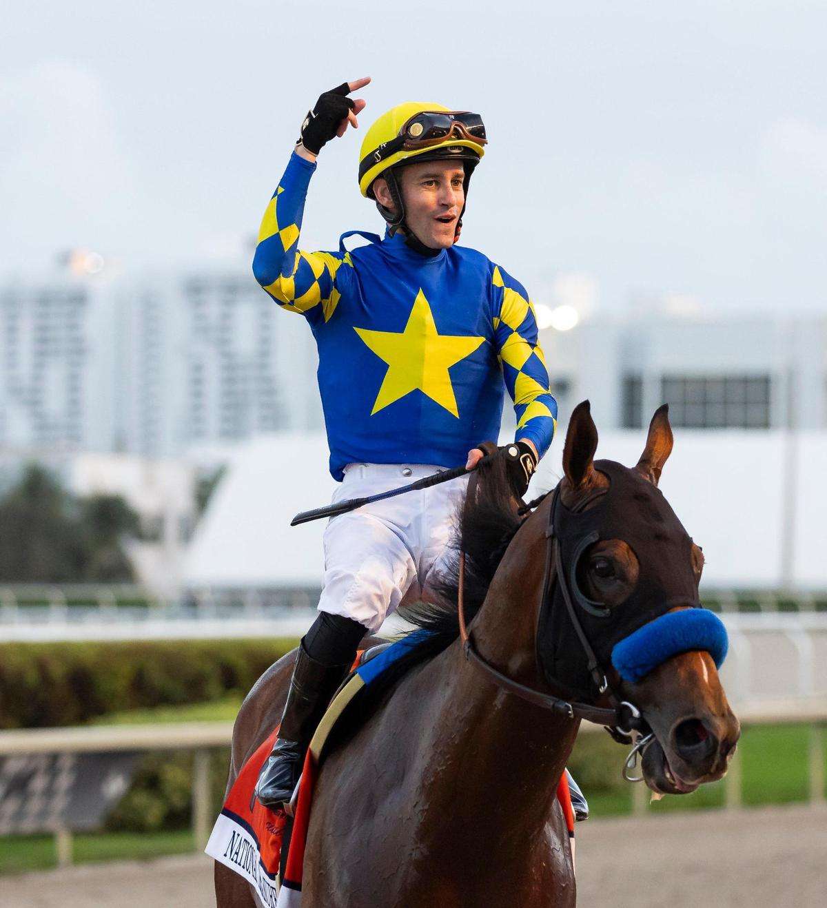 Flavien Prat riding, National Treasure (7) celebrates after placing first in the 3$ million Pegasus World Cup Invitational on dirt race at Gulfstream Park on Saturday, Jan. 27, 2024, in Hallandale Beach, Fla.