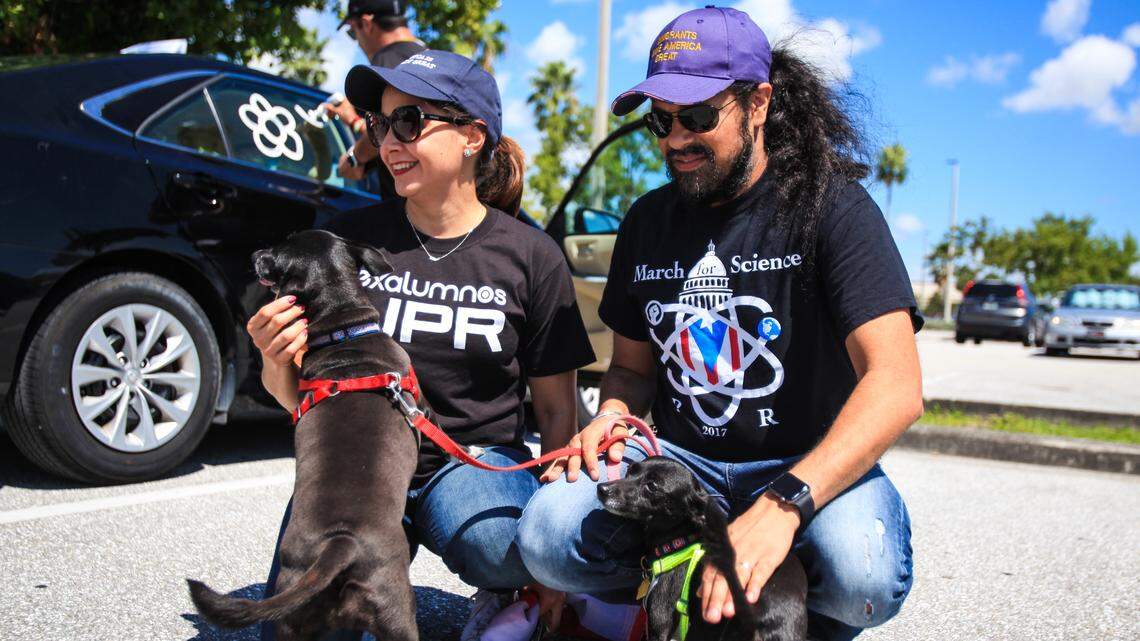 Frances Colón and her husband Romi Bahtia join the caravan to commemorate the victims of the devastating Hurricane Maria , one year later after plowing through Puerto Rico. Their dogs Roni and Ruby are rescued dogs from the island post the hurricane.