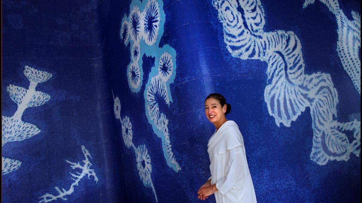 Artist Michele Oka Doner with her art installation at the Apogee Beach condo in Hollywood, Florida on July 15, 2013.