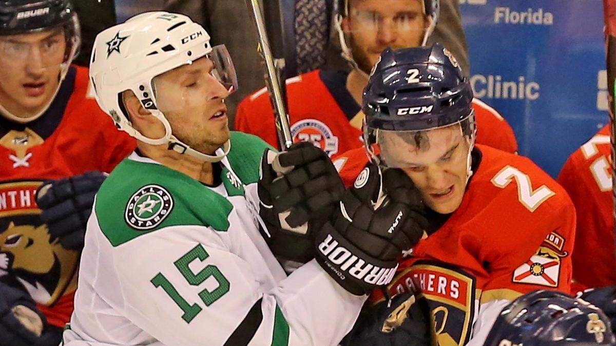 Florida Panthers Josh Brown 92) gets hit in the face by Dallas Stars Blake Comeau (15) in the third period at the BB&T Center in Sunrise, Florida, Tuesday, February, 12, 2019.