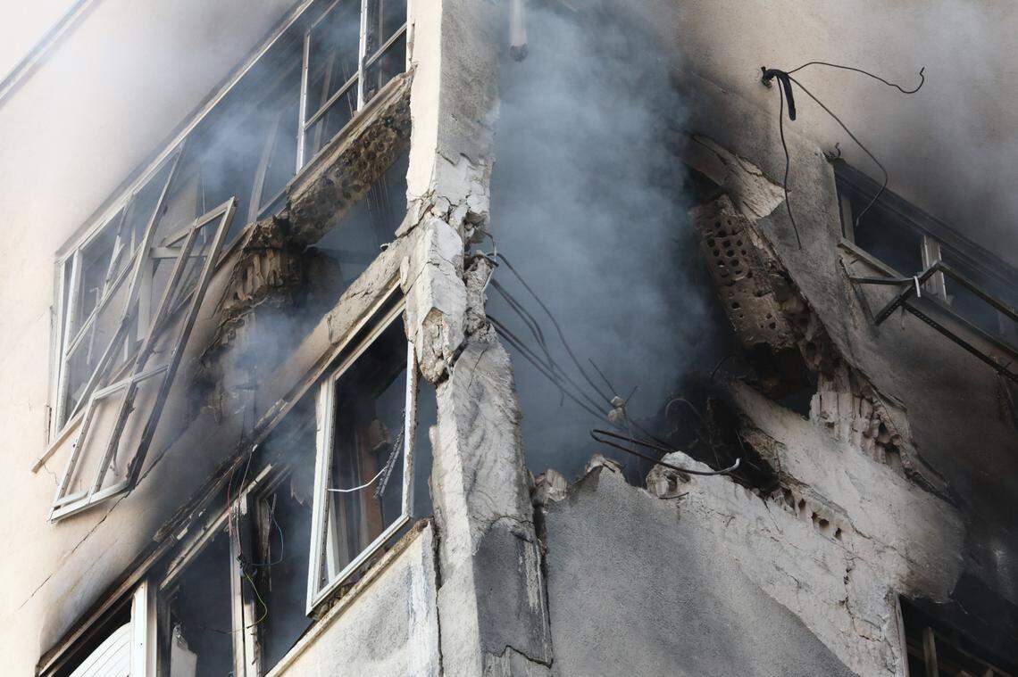 This photo taken on Oct. 7, 2023 shows a building hit by a rocket in Tel Aviv, Israel.