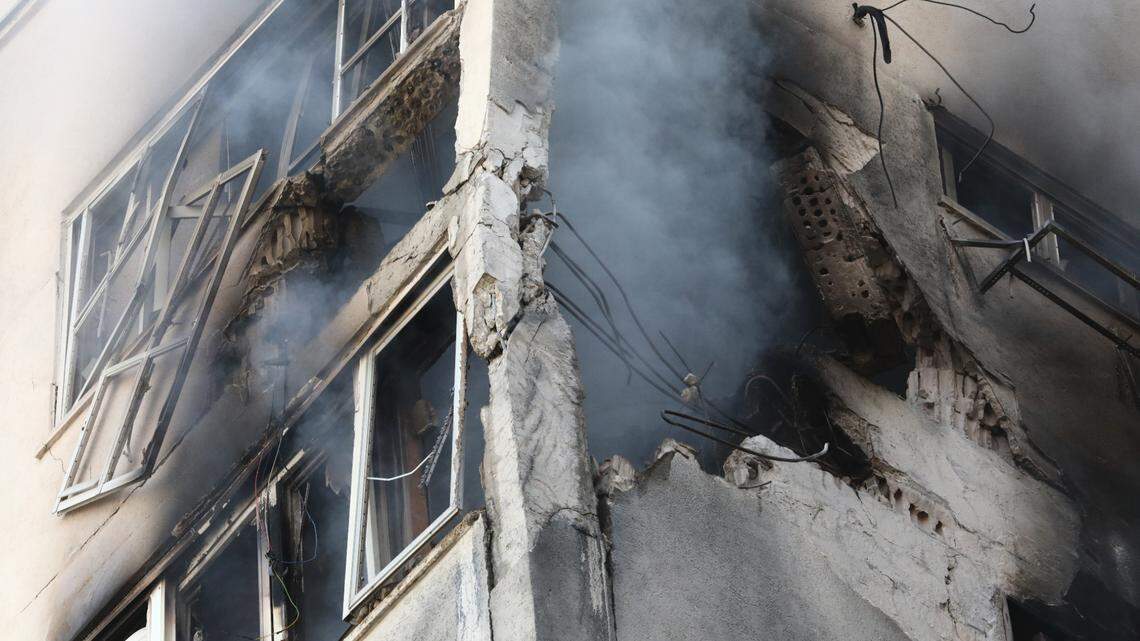 This photo taken on Oct. 7, 2023 shows a building hit by a rocket in Tel Aviv, Israel.
