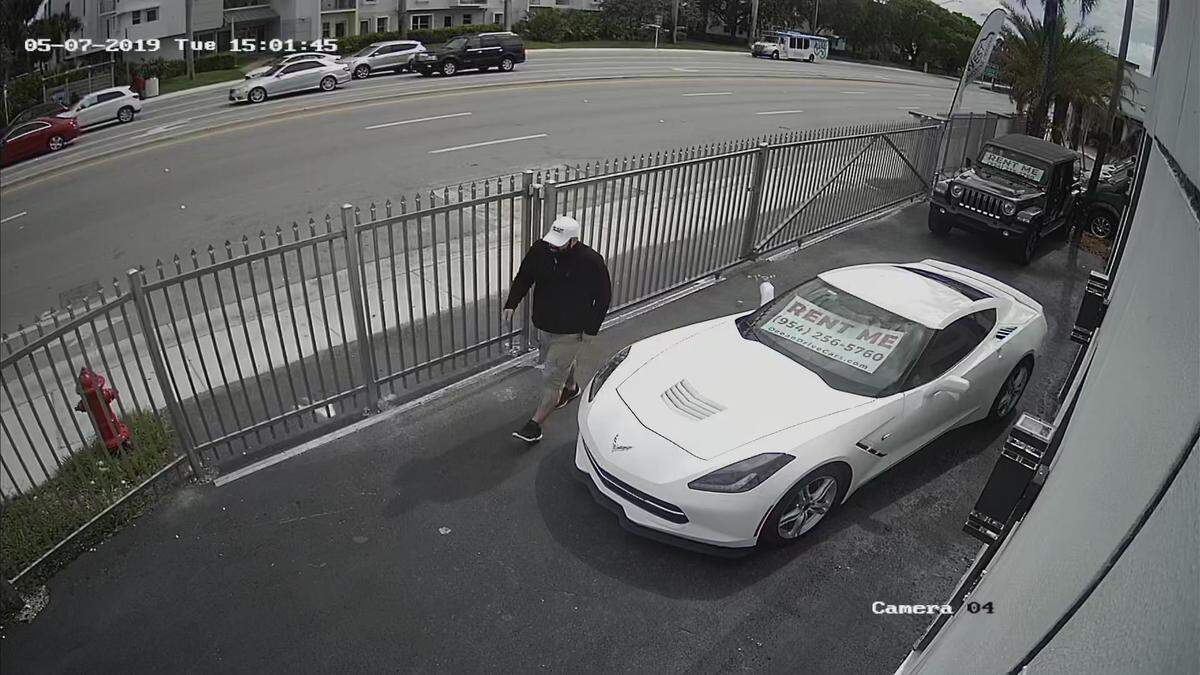 A man wearing the same color hat, jacket and pants as the man who attacked Ocean Drive Exotic Cars owner Eric Blumberg in the inside surveillance video strolls onto the car renter’s lot at 3:01 p.m. on May 7.