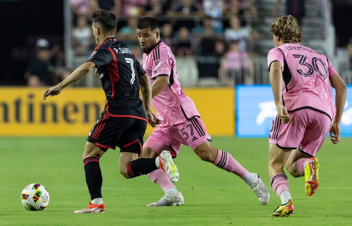 Inter Miami defender Marcelo Weigandt (57) defends against D.C. United forward Pedro Santos (7) in the first half of their MLS match at Chase Stadium on Saturday, May 18, 2024, in Fort Lauderdale, Fla.