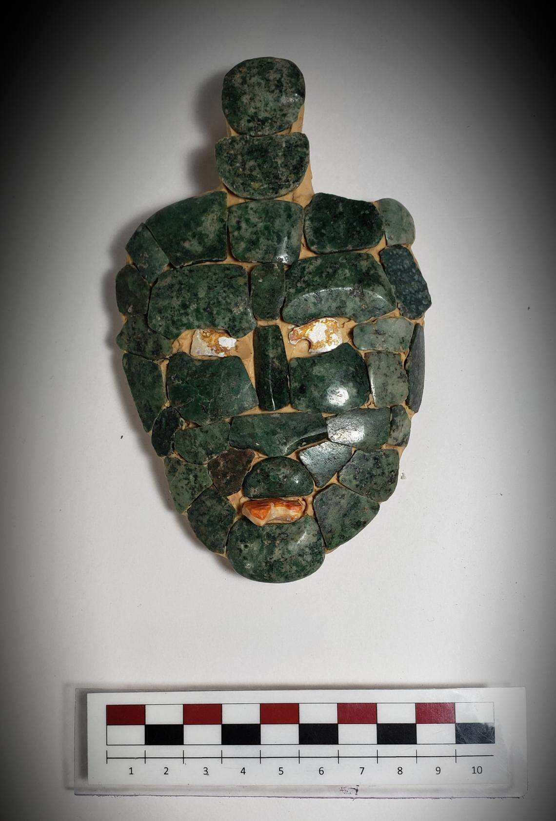 The jade mask found in the Maya burial.