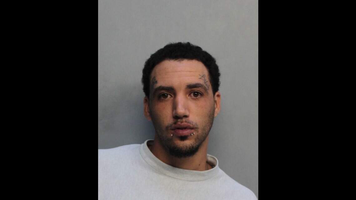 Man charged with murder of a jewelry designer inside his luxury condo, police say