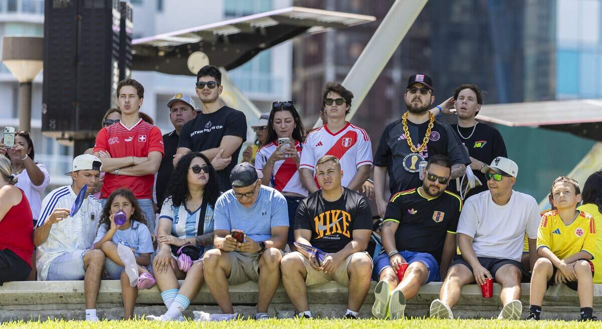 Fans watch a soccer match between Switzerland and Qatar during the FIFA Fan Festival Miami at Bayfront Park on Saturday, June 13, 2026, in downtown Miami, Fla.