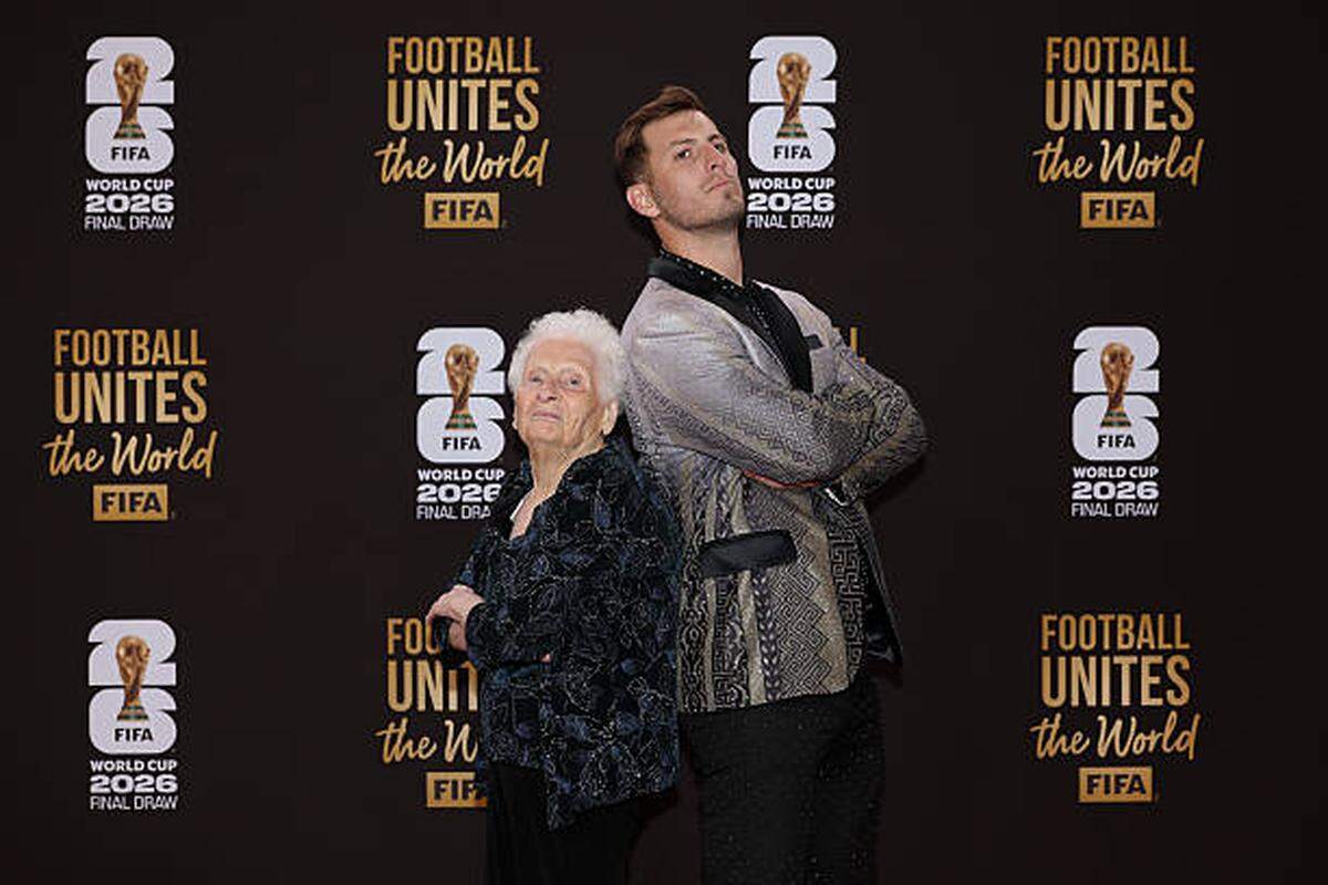 WASHINGTON, DC - DECEMBER 05: Ross Smith and Granny Smith pose on the red carpet prior to the FIFA World Cup 2026 Official Draw at John F. Kennedy Center for the Performing Arts on December 05, 2025 in Washington, DC.  (Photo by Emilee Chinn - FIFA/FIFA via Getty Images)