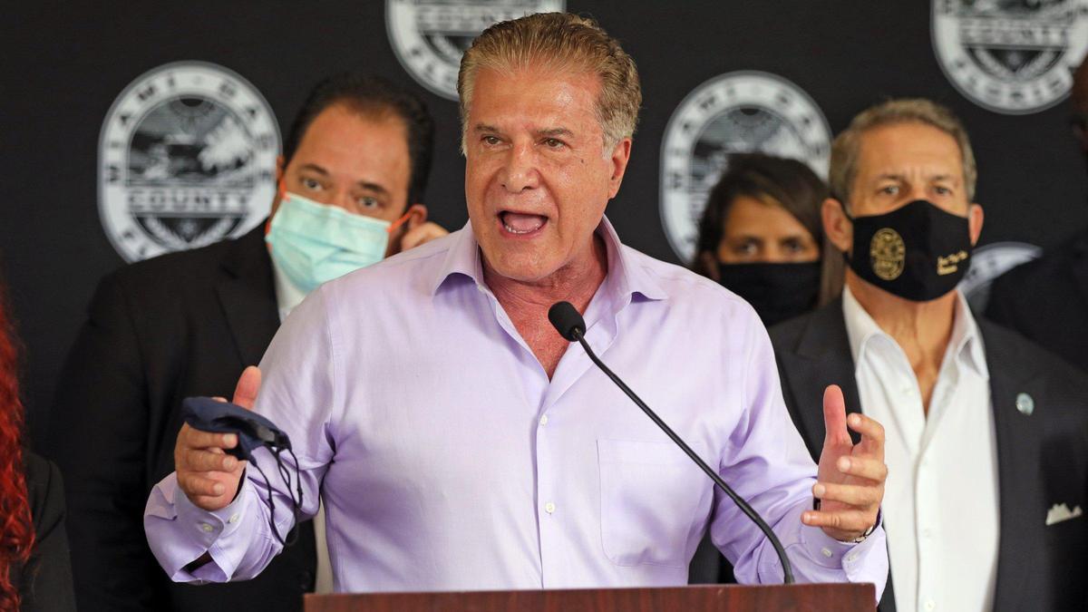 Hialeah Mayor Carlos Hernández joins Miami-Dade County Mayor Daniella Levine Cava during a press conference outside the Government Center to announce county measures to address the recent surge of COVID-19 cases and hospitalizations, and urge the community to get vaccinated on Wednesday, July 28, 2021.