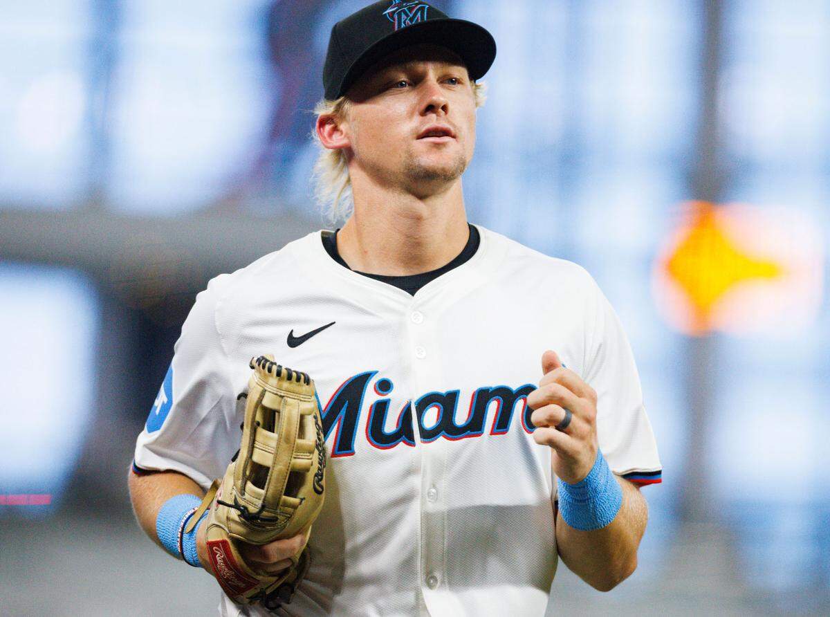 Miami Marlins outfielder Kyle Stowers (28), a new player on the Marlins, runs into the dugout during the first inning of a baseball game on Monday, Aug. 5, 2024, at loanDepot Park in Miami.