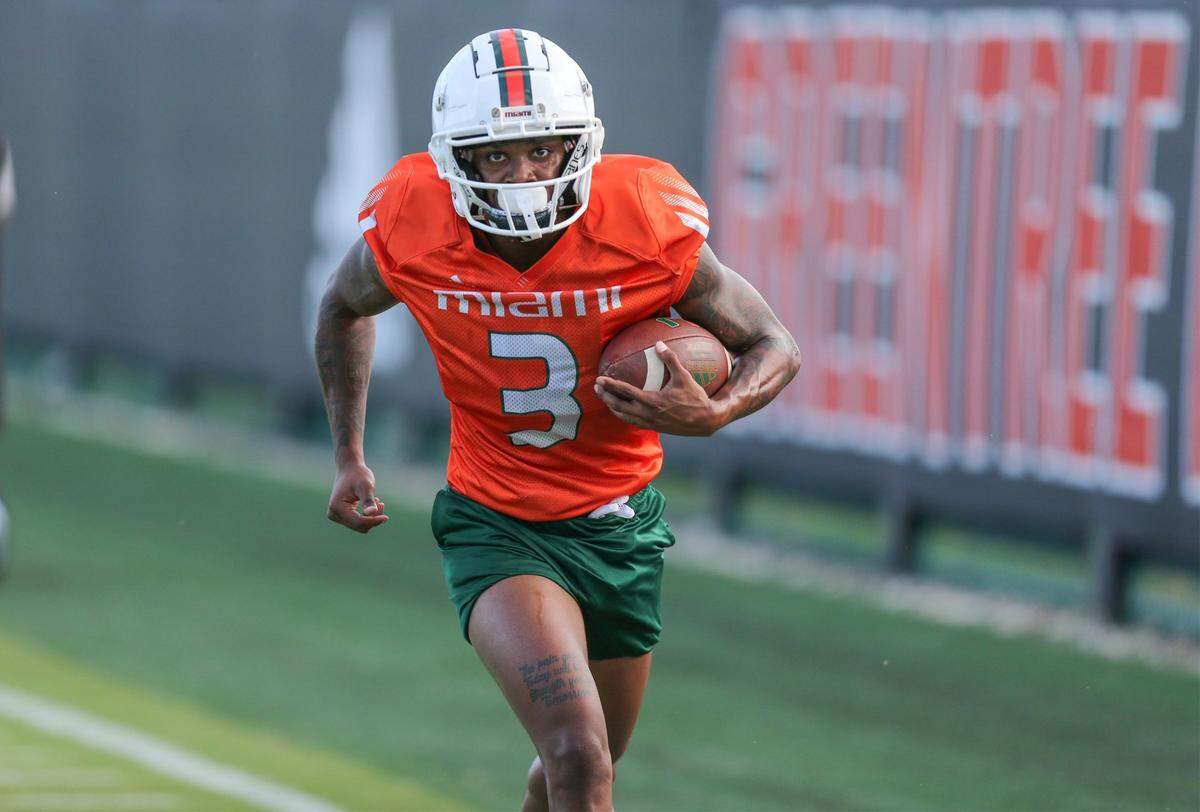 Miami Hurricanes wide receiver Mike Harley (3) runs drills during practice at the University of Miamis Greentree Practice Field in Coral Gables on Saturday, August 7, 2021.