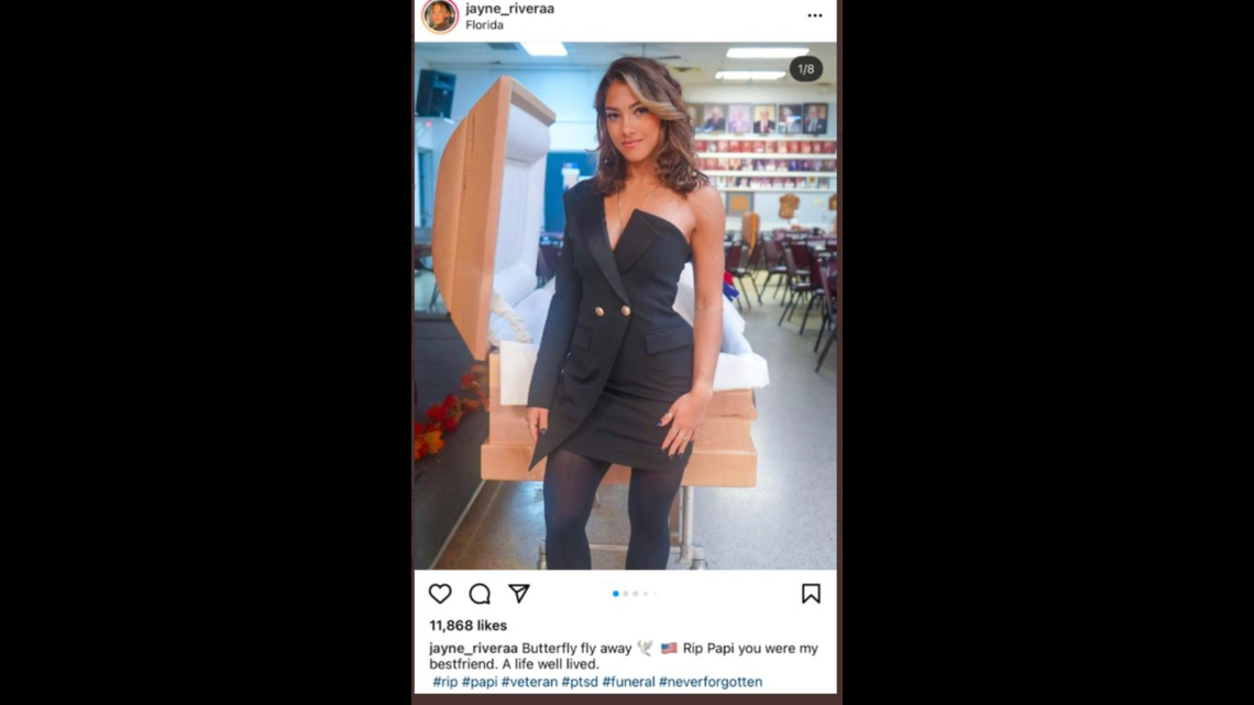 Instagram model poses in front of father’s open casket