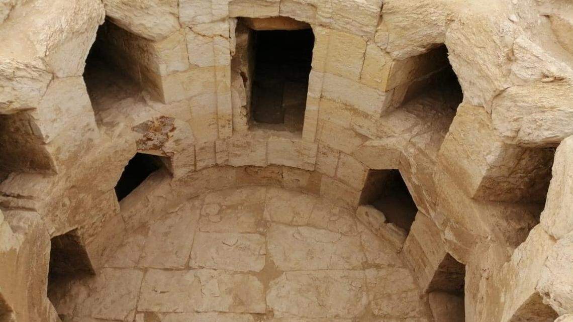 Archaeologists in Faiyum excavated a catacomb-style funeral building with several coffins from ancient Egyptian and Greek eras, photos show.