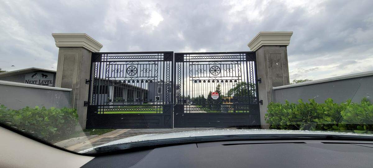 The Next Level Performance Center lists as president Aaron Goldsmith — the name issued to Reza Zarrab by the U.S. government. The business is set behinde these imposing gates.