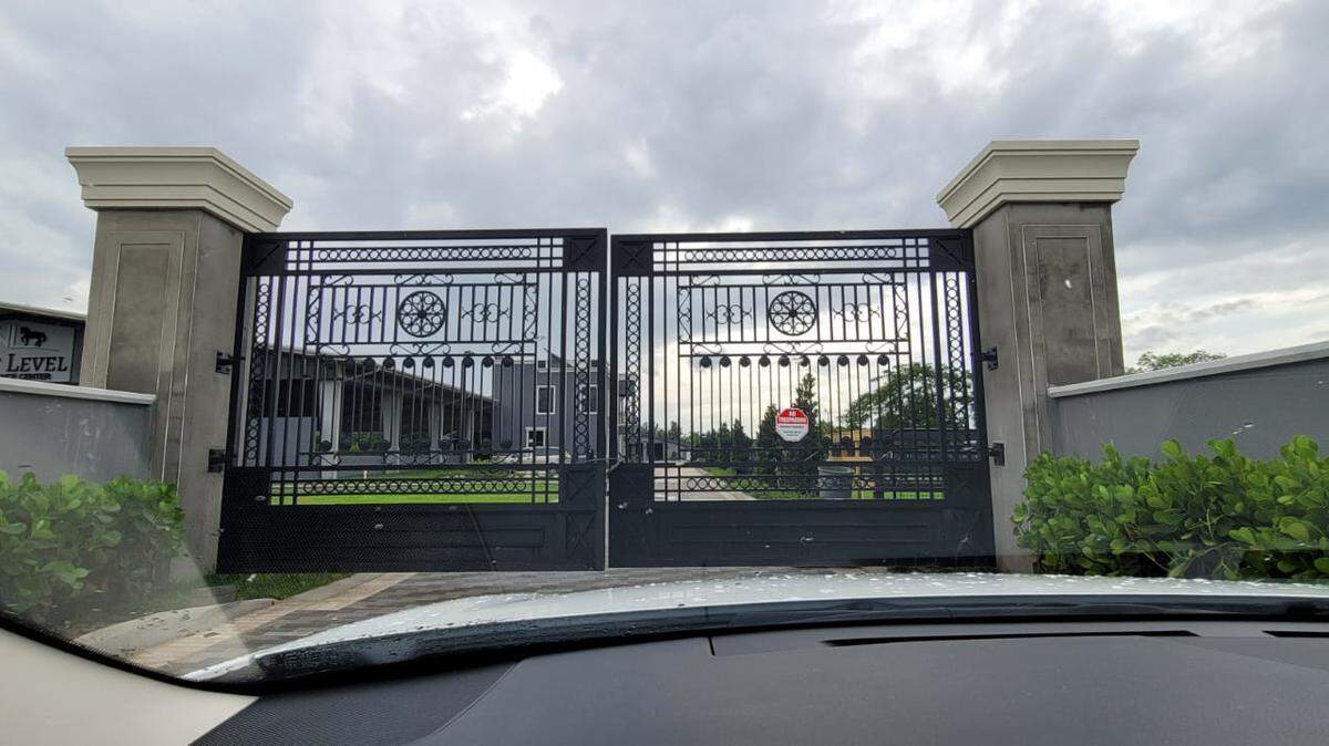 The Next Level Performance Center lists as president Aaron Goldsmith — the name issued to Reza Zarrab by the U.S. government. The business is set behinde these imposing gates.
