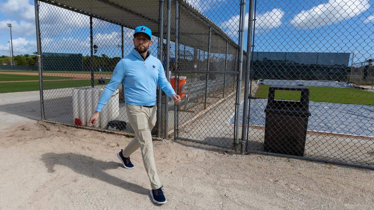 Miami Marlins President of Baseball Operations Peter Bendix leaves one of the practice field during spring training workouts for pitchers and catchers at Roger Dean Stadium in Jupiter, FL, on Wednesday, Feb. 12, 2025.