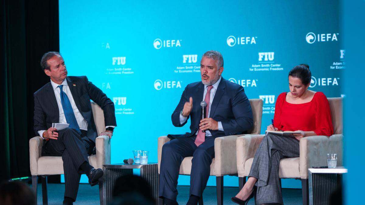 Former presidents Ivan Duque of Colombia (center) and Jorge Quiroga of Bolivia speak in a panel moderated by María Paula Romo, former interior minister of Ecuador, during the World Strategic Forum in Miami, on Tuesday, Nov. 7, 2023.