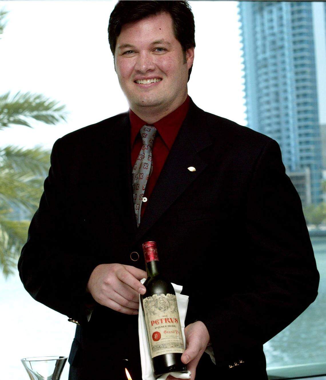 In 2004, sommelier Richard Hales, wine director at the Mandarin Oriental’s Azul restaurant, holds a bottle of Chateau Petrus 1966, a French wine of the Pomerol region.