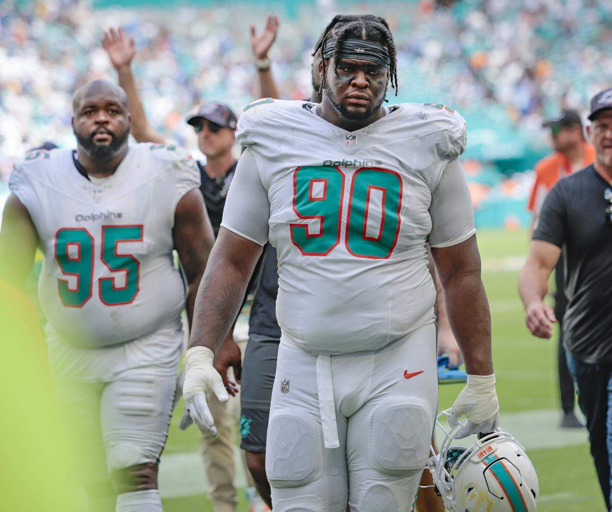 Miami Dolphins defensive tackle Kenneth Grant (90) walks off the field at halftime during their NFL football game against the Los Angeles Chargers at Hard Rock Stadium in Miami Gardens, FL, on Sunday, October 12, 2025. 