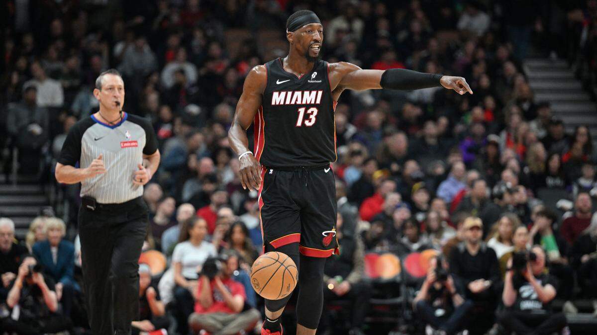 Miami Heat forward Bam Adebayo (13) controls the offense against the Toronto Raptors in the first half at Scotiabank Arena.