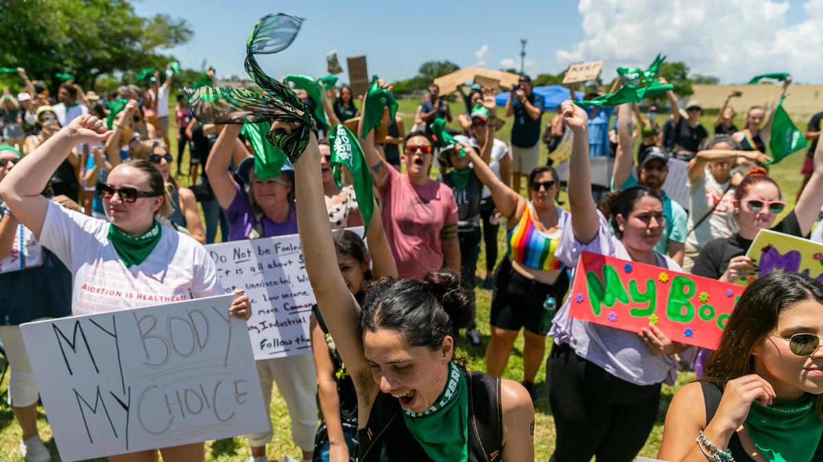 Rachel Fridman, bottom-center, from North Miami Beach, chants while attending the “Bans Off Our Bodies” rally at Ives Estates Park in Miami, Florida on Saturday, May 14, 2022. The rally was held in opposition of the leaked draft opinion from SCOTUS which aims to overturn Roe v. Wade, removing women’s constitutional right to an abortion.