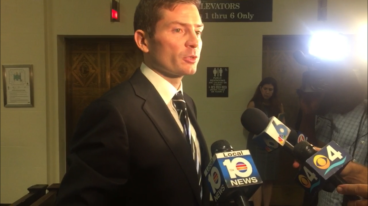 Attorney William Douglas Muir addresses reporters after a hearing on his lawsuit against the city of Miami on Wednesday, July 24. Muir contends the city is failing to follow its own competitive bidding rules for a referendum on the proposed soccer stadium and development at Melreese Country Club.