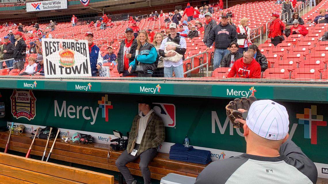 Miami Marlins third baseman Jake Burger points to the stands where friends and family gathered ahead of the team’s game against the St. Louis Cardinals on Thursday, April 4, 2024, at Busch Stadium in St. Louis, Missouri.