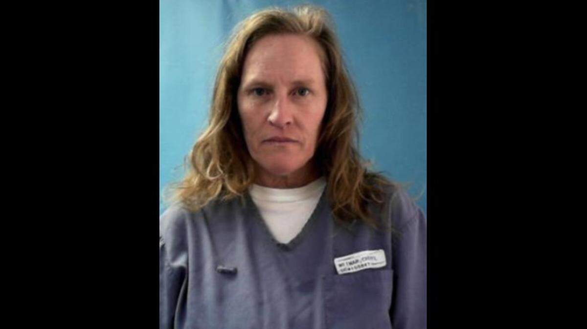 Cheryl A. Weimar in her prison mug shot, before she was beaten and nearly killed by staff members at Lowell Correctional Institution.